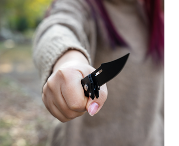 woman holding knife